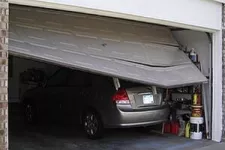 I’ve backed my car into my garage door. What should I do?